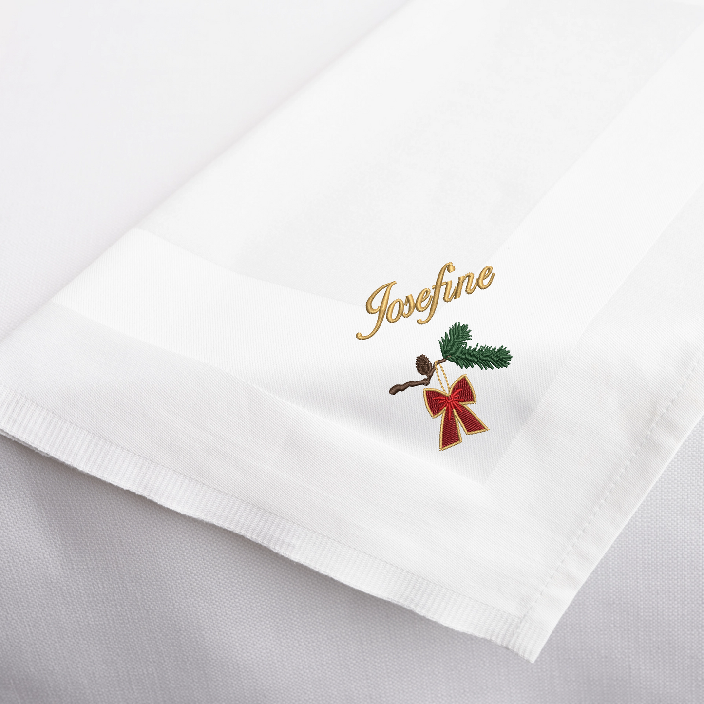 Grangren med rød julesløjfe